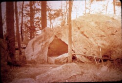 Long before Norton became a town, and before the colonists settled in this area, Bristol County was inhabited by the Wampanoag, Massachusetts and Narragansett Tribes. The Wampanoag and Massachusetts were predominantly in the area that later became Norton. Prior to 1620, many of the indigenous Americans were wiped out by disease, most likely smallpox, and their tribes were dwindling. At the time of the Pilgrims' landing, the Wampanoag's sachem, Chief Massasoit, befriended the colonists and he was responsible for helping them survive their first winter. He brought them food and helped them plant crops that would survive in this soil, such as corn, beans and other vegetables. He was always friendly toward the Colonists. Chief Massasoit, who fathered 5 children, had two sons who succeeded him, Wamsutta and Metacomet. When Massasoit died in 1661, Wamsutta became the sachem, although he died only one year later in 1662, and Metacomet took over. Metacomet went by his English name that was given to him by the Plymouth court, "Philip" and when he became the chief of his tribe, he was called "King Philip".
In the summers, King Philip resided in the area that is now Raynham, but he would go on hunting and fishing expeditions near Winnecunnet Pond and stay in what we refer to now as King Philip's cave. His cave, which is still standing today, is in the Winnecunnet section of town off of Plain St. Over the years, many artifacts have been found in the Winnecunnet area including stone hatchets and arrow points. King Philip respected his father’s treaties with the colonists and maintained a friendly and supportive attitude with them. He was good friends with the Leonard family who settled in this area in 1669. The Leonards would repair King Philip's guns and supply him with iron and tools. When King Philip's War broke out in 1675, he gave his tribe strict orders "never to injure a Leonard", and it is believed that this friendship was one of the reasons Taunton (which Norton was a part of at the time) was spared. The war was started in 1675 as tensions between the Native Americans and the Colonists were rising due to the colonists expanding their land use, diminishing the game supply, and other tensions. King Philip was assassinated by John Alderman, a “praying indian”, (an indian who has converted to Christianity) in Bristol, Rhode Island in 1676.